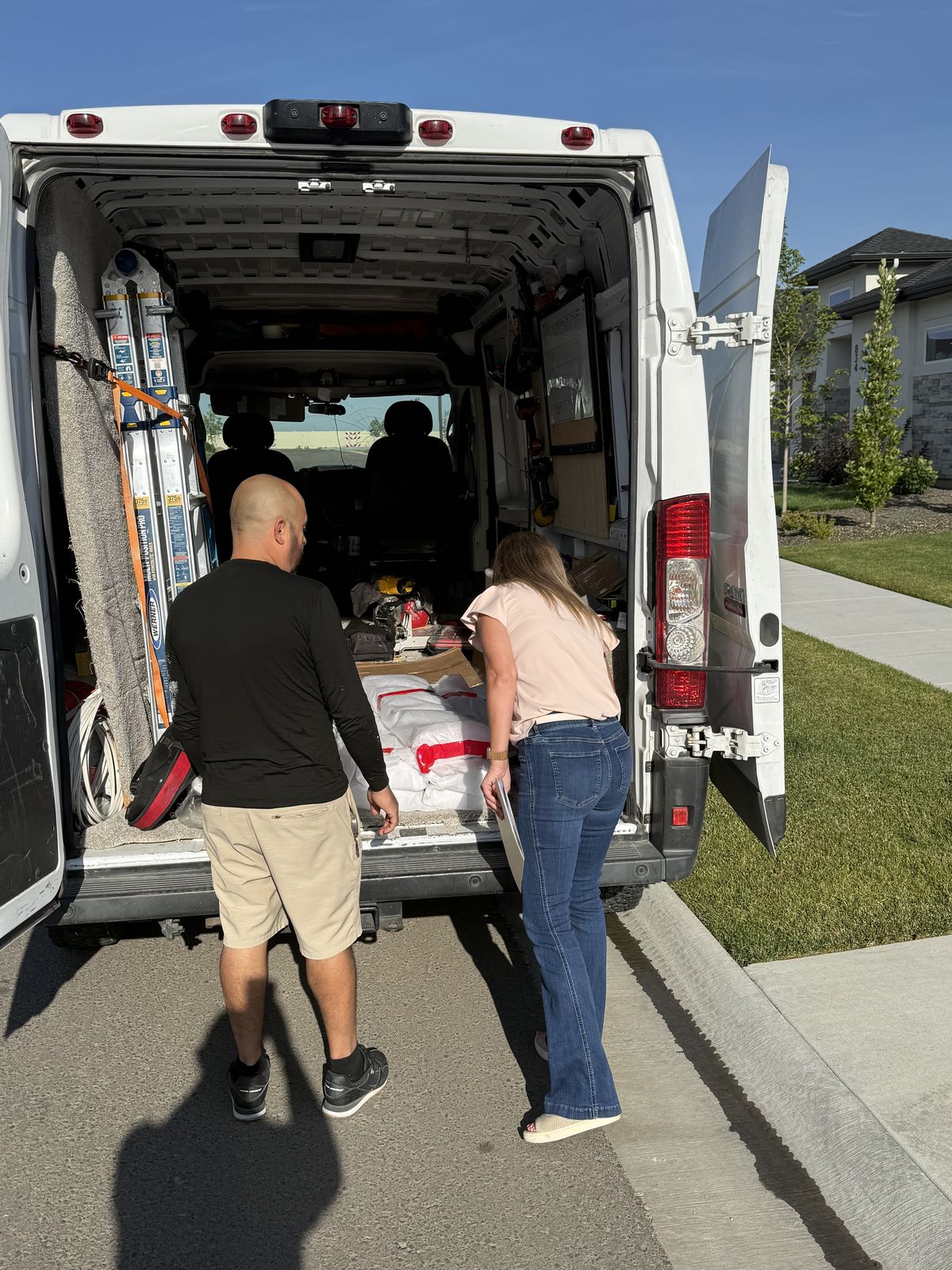 Consulting with a client at the service van before installation